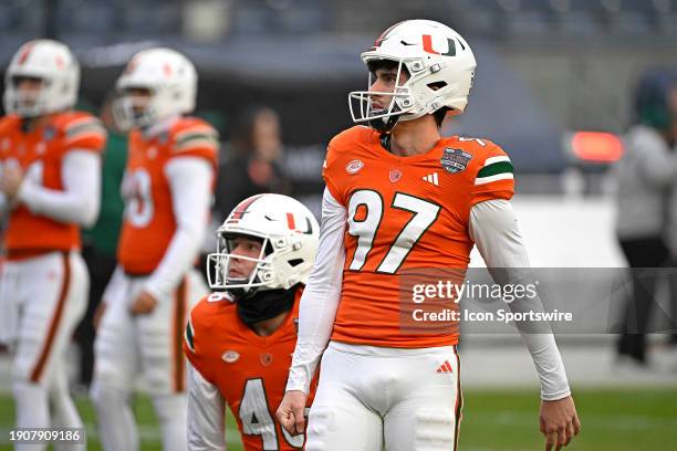 Miami punter Will Hutchinson warms up prior to the game as the Miami Hurricanes faced the Rutgers Scarlett Knights on December 28 at Yankee Stadium...