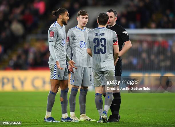 Dominic Calvert-Lewin of Everton speaks with Match Referee, Chris Kavanagh after receiving a red card during the Emirates FA Cup Third Round match...