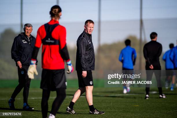 Genk's goalkeeper Maarten Vandevoordt and Genk's head coach Wouter Vrancken pictured during a training session at the winter training camp of Belgian...