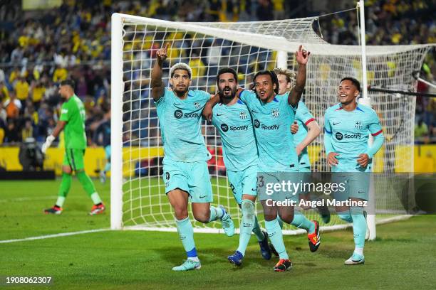 Ilkay Gundogan of FC Barcelona celebrates with teammates after scoring their team's second goal from a penalty during the LaLiga EA Sports match...