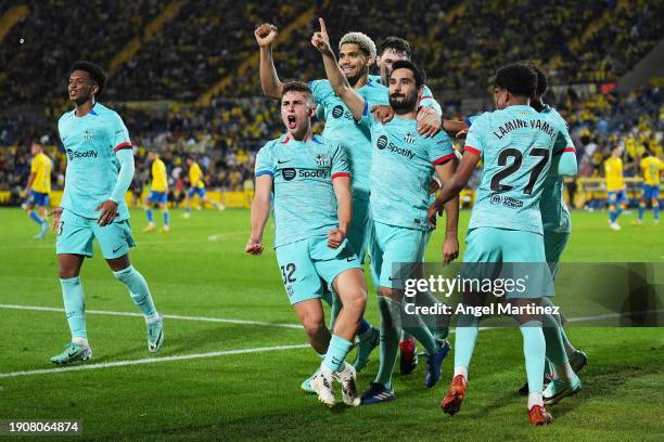 Ilkay Gundogan of FC Barcelona celebrates with teammates after scoring their team's second goal from a penalty during the LaLiga EA Sports match...