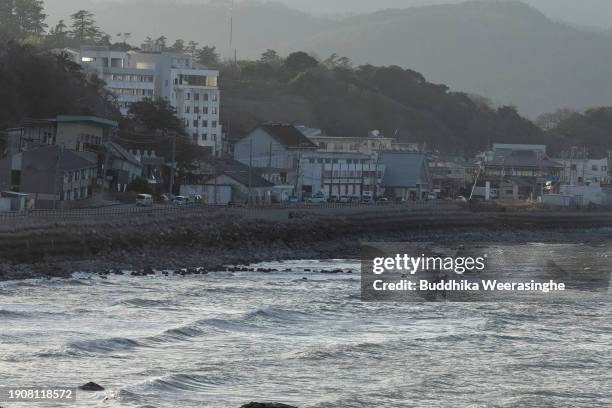 Damaged buildings and coastal city view following the magnitude 7.1 and aftershock earthquake on January 04, 2024 in Wajima, Japan. A series of major...