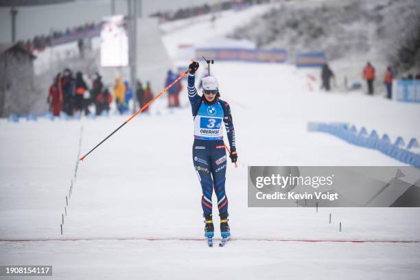 Julia Simon of France celebrates in the finish for winning the Women 4x6km Relay at the BMW IBU World Cup Biathlon Oberhof on January 7, 2024 in...