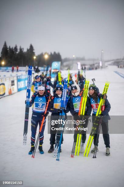 Julia Simon of France, Sophie Chauveau of France, Justine Braisaz-Bouchet of France and Lou Jeanmonnot of France celebrates in the finish for winning...