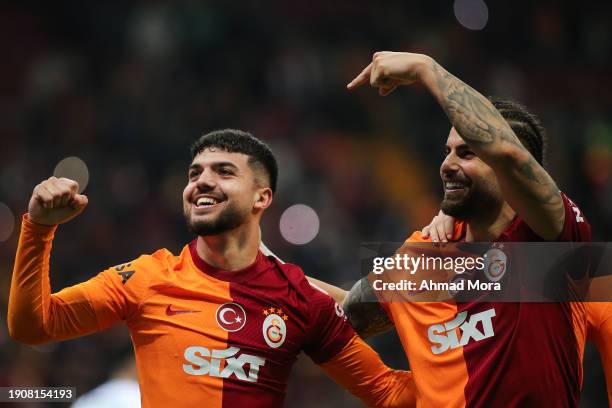 Abdulkerim Bardakci of Galatasaray celebrates with teammate Eyup Aydin after scoring his team's third goal during the Turkish Super League match...