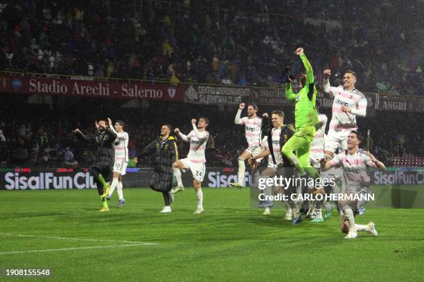 Juventus' players celebrate their 2-1 win at the end of the Italian Serie A football match between US Salernitana and Juventus FC at the Arechi...