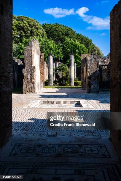 Ruins of the Casa del Cinghiale in the archaeological site of Pompeii, an ancient city destroyed by the eruption of Mount Vesuvius in 79 AD. The...