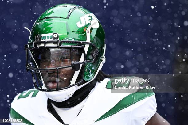 Israel Abanikanda of the New York Jets runs onto the field prior to the start of the game against the New England Patriots at Gillette Stadium on...