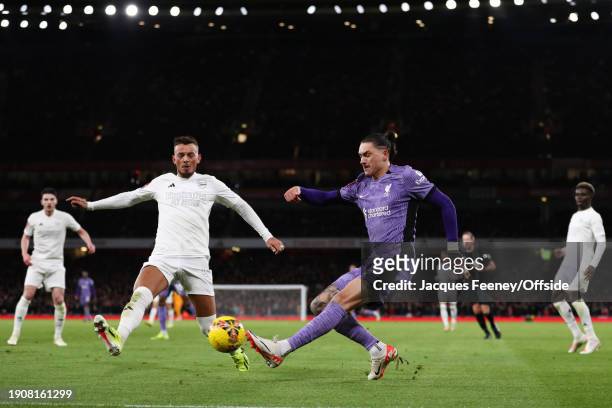 Darwin Nunez of Liverpool and Ben White of Arsenal during the Emirates FA Cup Third Round match between Arsenal and Liverpool at Emirates Stadium on...