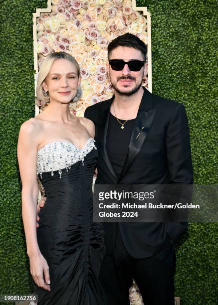 Carey Mulligan and Marcus Mumford at the 81st Golden Globe Awards held at the Beverly Hilton Hotel on January 7, 2024 in Beverly Hills, California.
