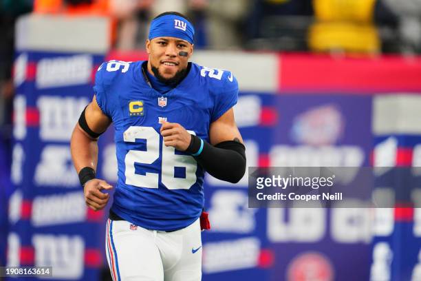 Saquon Barkley of the New York Giants takes the field before kickoff against the Philadelphia Eagles at MetLife Stadium on January 7, 2024 in East...