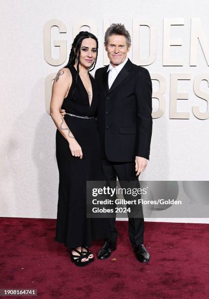 Giada Colagrande and Willem Dafoe at the 81st Golden Globe Awards held at the Beverly Hilton Hotel on January 7, 2024 in Beverly Hills, California.