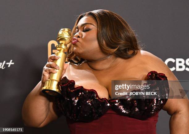 Actress Da'Vine Joy Randolph poses with the award for Best Performance by a Female Actor in a Supporting Role in any Motion Picture for "The...
