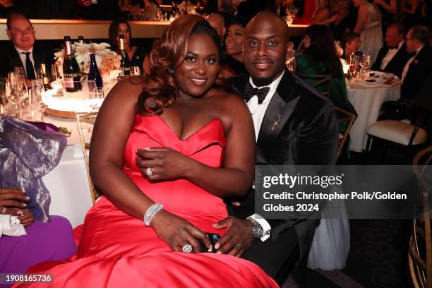 Danielle Brooks and Dennis Gelin at the 81st Golden Globe Awards held at the Beverly Hilton Hotel on January 7, 2024 in Beverly Hills, California.