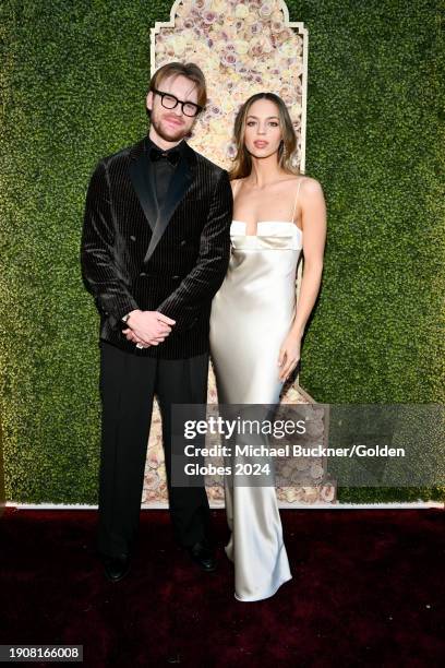 And Claudia Sulewski at the 81st Golden Globe Awards held at the Beverly Hilton Hotel on January 7, 2024 in Beverly Hills, California.