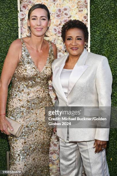 Alex Sykes and Wanda Sykes at the 81st Golden Globe Awards held at the Beverly Hilton Hotel on January 7, 2024 in Beverly Hills, California.