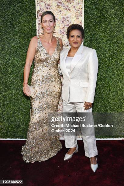 Alex Sykes and Wanda Sykes at the 81st Golden Globe Awards held at the Beverly Hilton Hotel on January 7, 2024 in Beverly Hills, California.