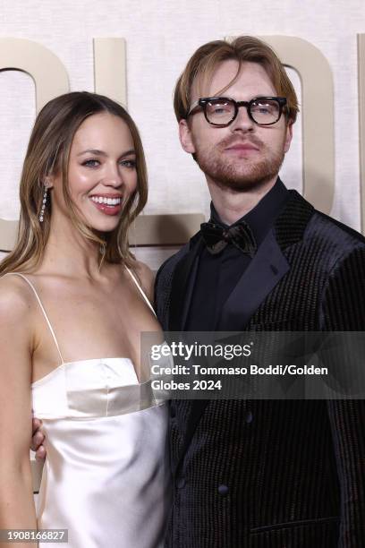 Claudia Sulewski and FINNEAS at the 81st Golden Globe Awards held at the Beverly Hilton Hotel on January 7, 2024 in Beverly Hills, California.