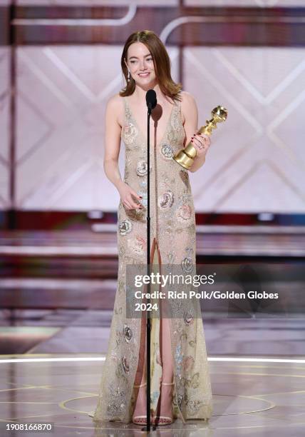 Emma Stone accepts the award for Best Performance by a Female Actor in a Motion Picture Musical or Comedy for "Poor Things" at the 81st Golden Globe...