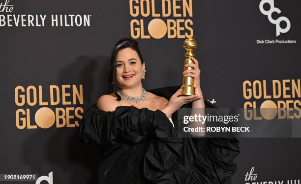 Actress Lily Gladstone poses with the award for Best Performance by a Female Actor in a Motion Picture - Drama for "Killers of the Flower Moon" in...
