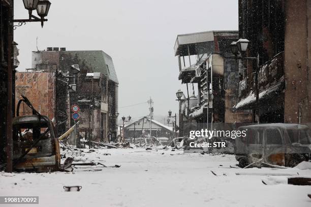 Snow blankets part of the disaster-hit area in the city of Wajima, Ishikawa prefecture on January 8 a week after a major 7.5 magnitude earthquake...