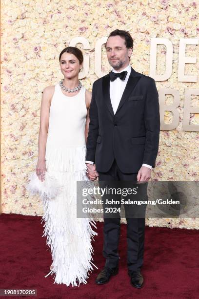 Keri Russell and Matthew Rhys at the 81st Golden Globe Awards held at the Beverly Hilton Hotel on January 7, 2024 in Beverly Hills, California.