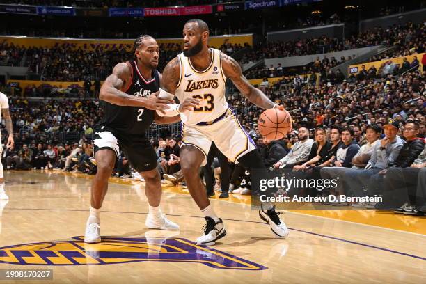 LeBron James of the Los Angeles Lakers handles the ball during the game against the LA Clippers on January 7, 2024 at Crypto.Com Arena in Los...