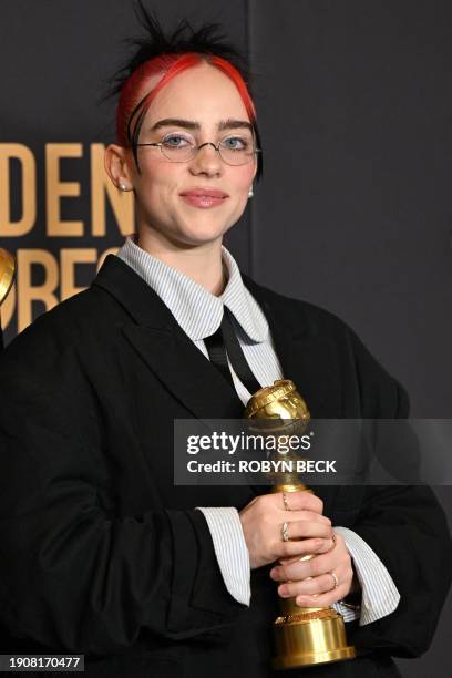 Singer Billie Eilish poses with the award for Best Original Song - Motion Picture "What Was I Made For" from the movie "Barbie"in the press room...