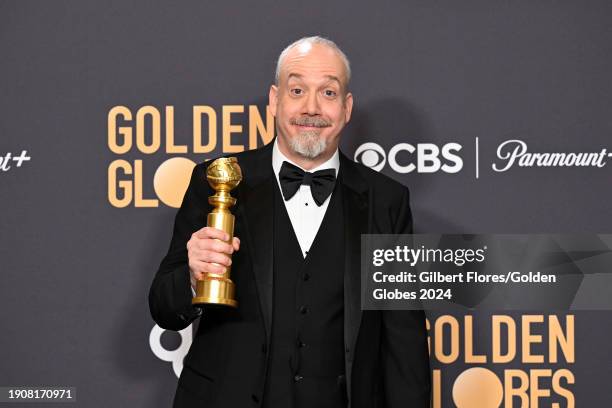 Paul Giamatti poses with the award for Best Performance by a Male Actor in a Motion Picture Musical or Comedy for his role in "The Holdovers" at the...