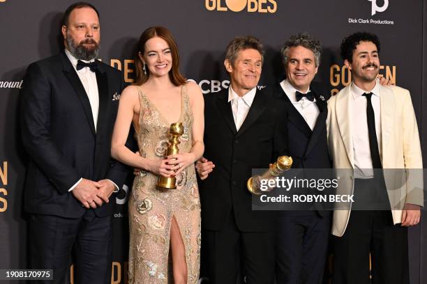 Greek director Yorgos Lanthimos, US actress Emma Stone, US actor Willem Dafoe, US actor Mark Ruffalo and US actor Ramy Youssef pose in the press room...