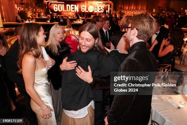 Claudia Sulewski, Maggie May Baird and Ludwig Göransson at the 81st Golden Globe Awards held at the Beverly Hilton Hotel on January 7, 2024 in...