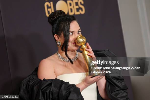 Lily Gladstone poses with the award for Best Performance by a Female Actor in a Motion Picture Drama for "Killers of the Flower Moon" at the 81st...