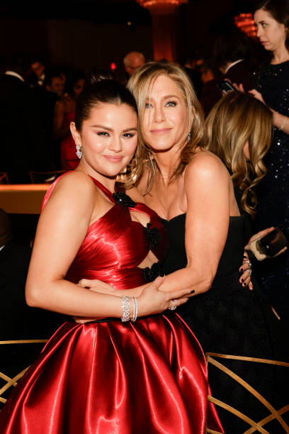 Selena Gomez and Jennifer Aniston at the 81st Annual Golden Globe Awards, airing live from the Beverly Hilton in Beverly Hills, California on Sunday,...