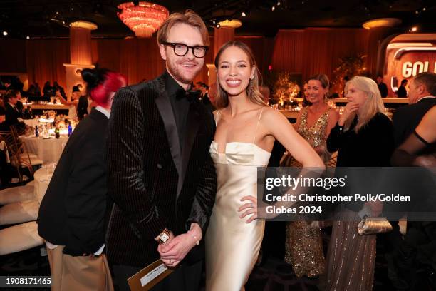 Finneas and Claudia Sulewski at the 81st Golden Globe Awards held at the Beverly Hilton Hotel on January 7, 2024 in Beverly Hills, California.