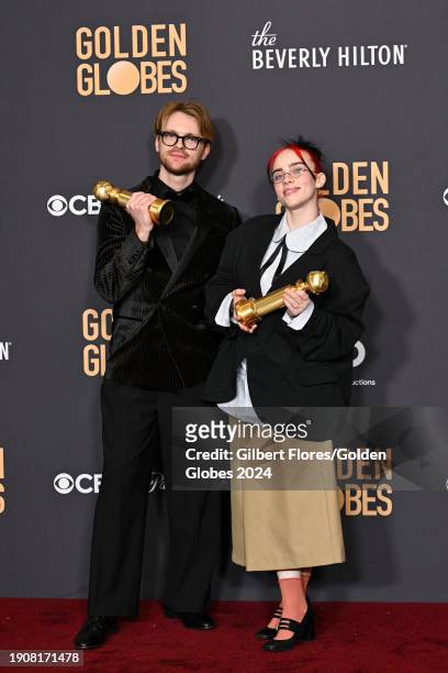 And Billie Eilish pose with the award for Best Original Song - Motion Picture for "What Was I Made For?" in "Barbie" at the 81st Golden Globe Awards...