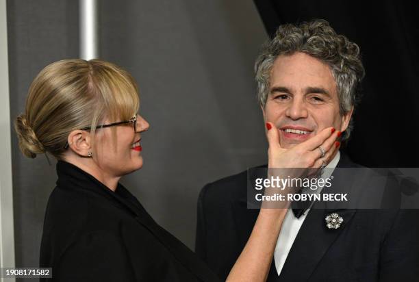 Actor Mark Ruffalo and his wife Sunrise Coigney arrive in the press room during the 81st annual Golden Globe Awards at The Beverly Hilton hotel in...