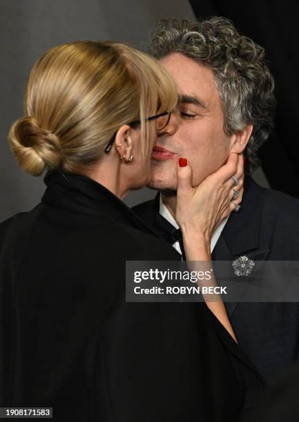 Actor Mark Ruffalo and his wife Sunrise Coigney arrive in the press room during the 81st annual Golden Globe Awards at The Beverly Hilton hotel in...