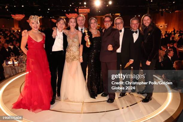 Florence Pugh, Cillian Murphy, Emily Blunt, Christopher Nolan, Emma Thomas, Robert Downey Jr., Charles Roven, Matt Damon and Ludwig Göransson accept...