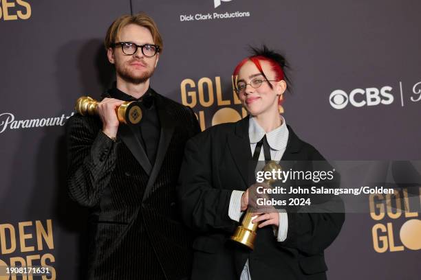 And Billie Eilish pose with the award for Best Original Song - Motion Picture for "What Was I Made For?" at the 81st Golden Globe Awards held at the...