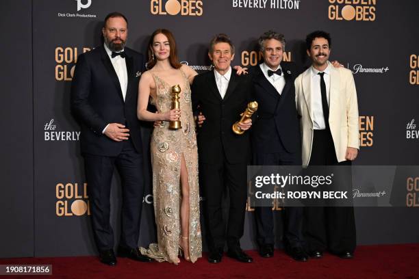 Greek director Yorgos Lanthimos, US actress Emma Stone, US actor Willem Dafoe, US actor Mark Ruffalo and US actor Ramy Youssef pose in the press room...