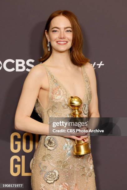 Emma Stone receives the award for Best Performance by a Female Actor in a Motion Picture, Musical or Comedy at the 81st Golden Globe Awards held at...