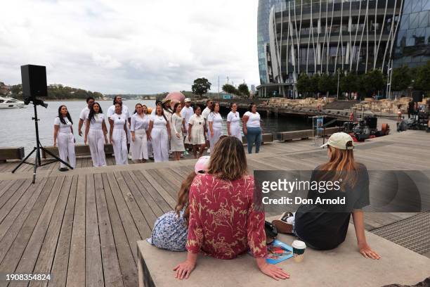 People look on as a traditional Māori song is performed by Te Aranganui choir during the opening day press call for Sydney Festival 2024 on January...