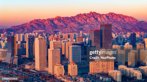 Skyscrapers are being seen in the West Coast New Area of Qingdao, Shandong Province, China, on January 7, 2024.