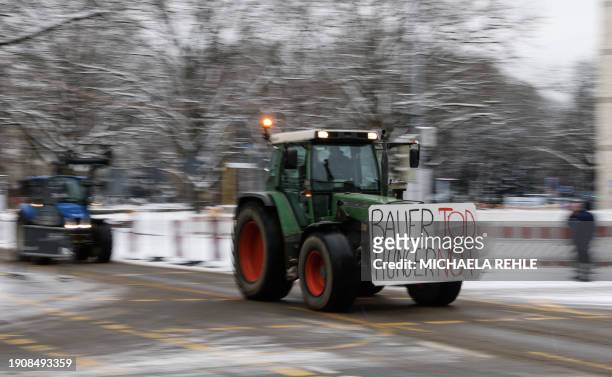 Farmers on their tractors with a banner reading "Farmers dead - starvation" converge to the city center to take part in protests against the federal...