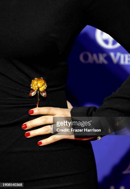 America Ferrera, jewelry detail, attends the 35th Annual Palm Springs International Film Awards at Palm Springs Convention Center on January 04, 2024...