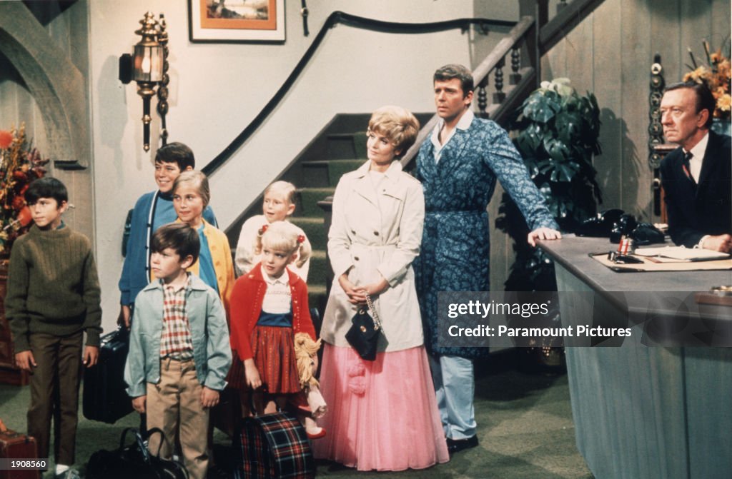 'The Brady Bunch' Stand In Hotel Lobby.