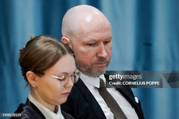 Anders Behring Breivik is seen next to attorney Marte Lindholm during the first day of his trial over his prison conditions, on January 8, 2024 in...