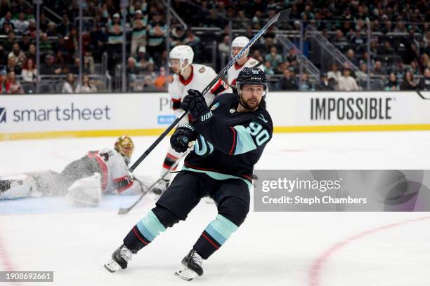 Tomas Tatar of the Seattle Kraken scores a goal against Joonas Korpisalo of the Ottawa Senators during the second period at Climate Pledge Arena on...