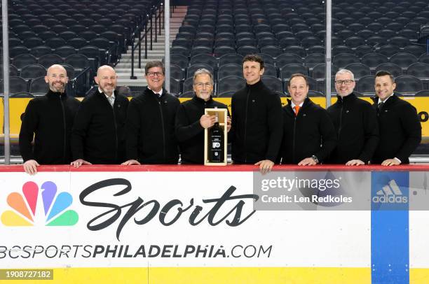 Head Coach John Tortorella of the Philadelphia Flyers poses with his coaching staff Adam Patterson, Darryl Williams, Brad Shaw, Rocky Thompson,...