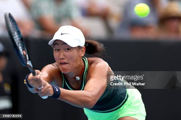 Xiyu Wang of China plays a backhand in her match against Diane Parry of France during the 2024 Women's ASB Classic at ASB Tennis Centre on January...